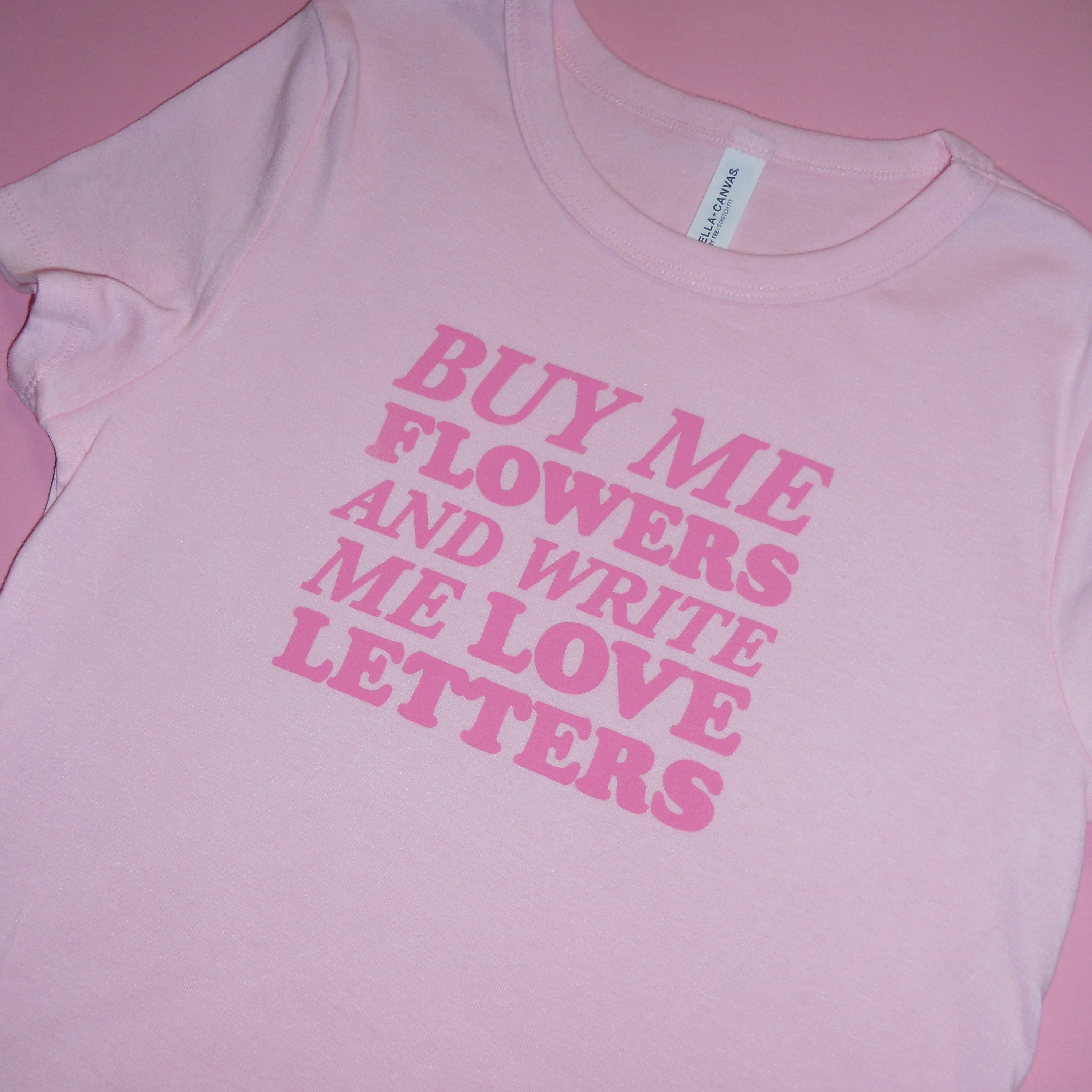 BUY ME FLOWERS AND WRITE ME LOVE LETTERS baby tee