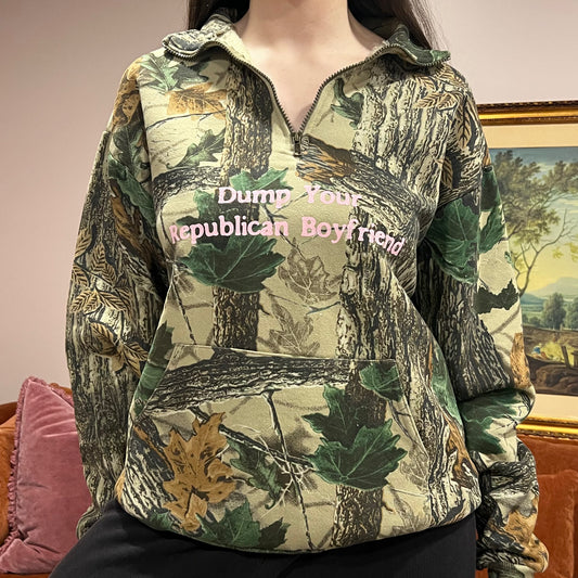 DUMP YOUR REPUBLICAN BOYFRIEND camo zip-up with pink text (L)