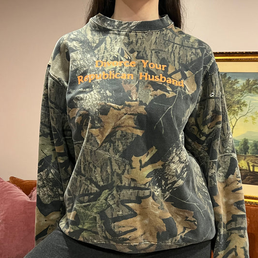 DIVORCE YOUR REPUBLICAN HUSBAND camo crewneck with orange text (L)