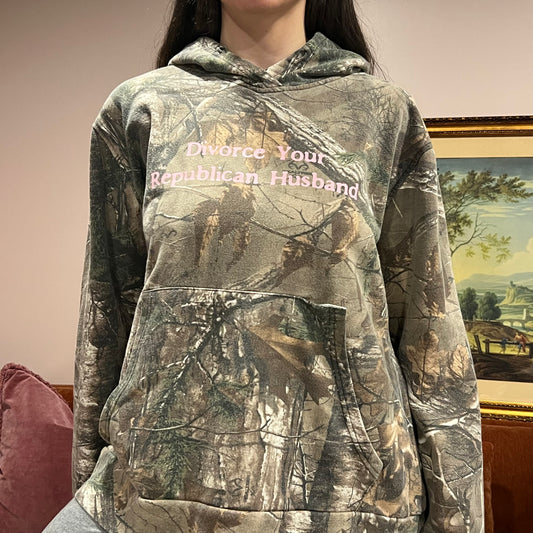 DIVORCE YOUR REPUBLICAN HUSBAND camo hoodie with pink text (XL)