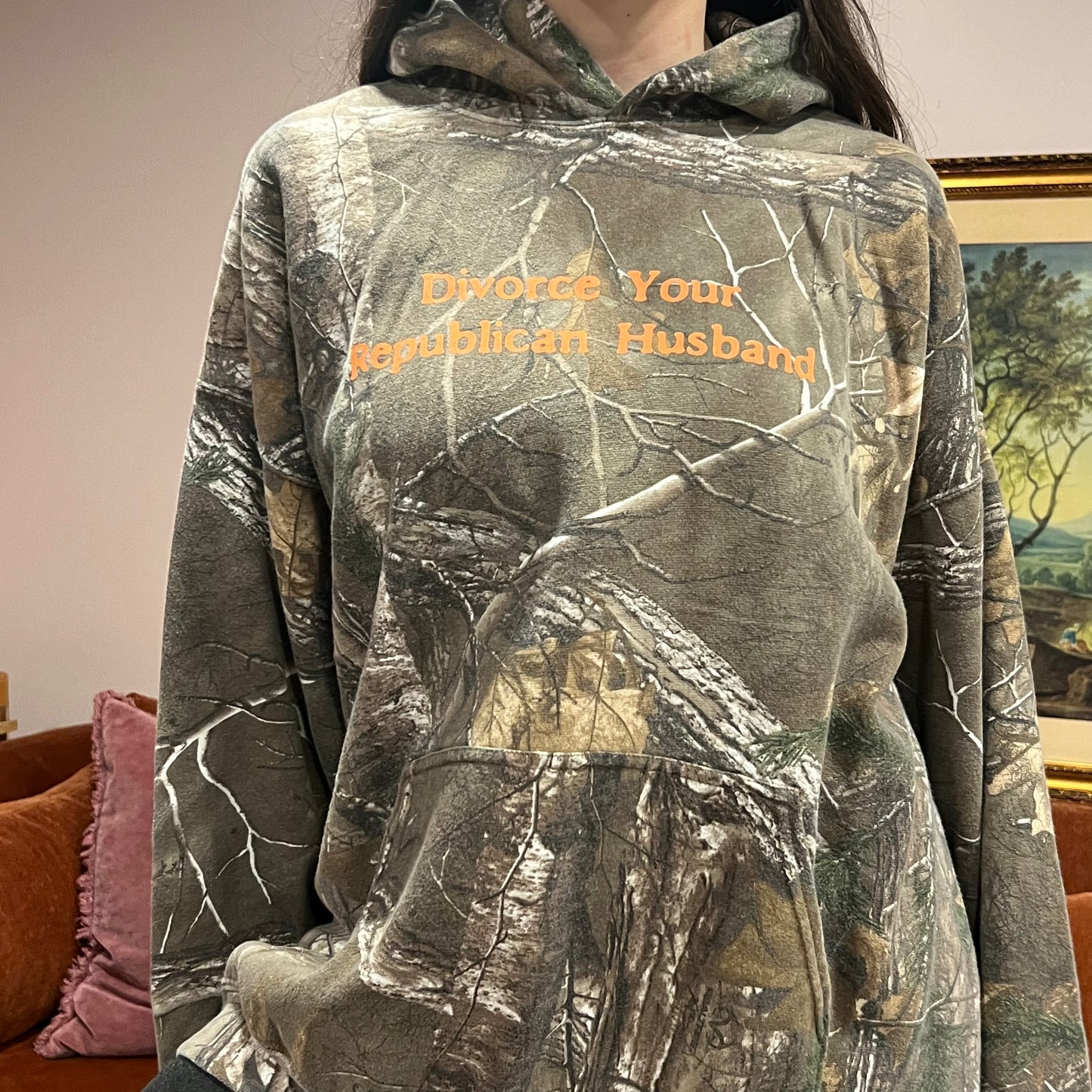 DIVORCE YOUR REPUBLICAN HUSBAND camo hoodie with orange text (XL)