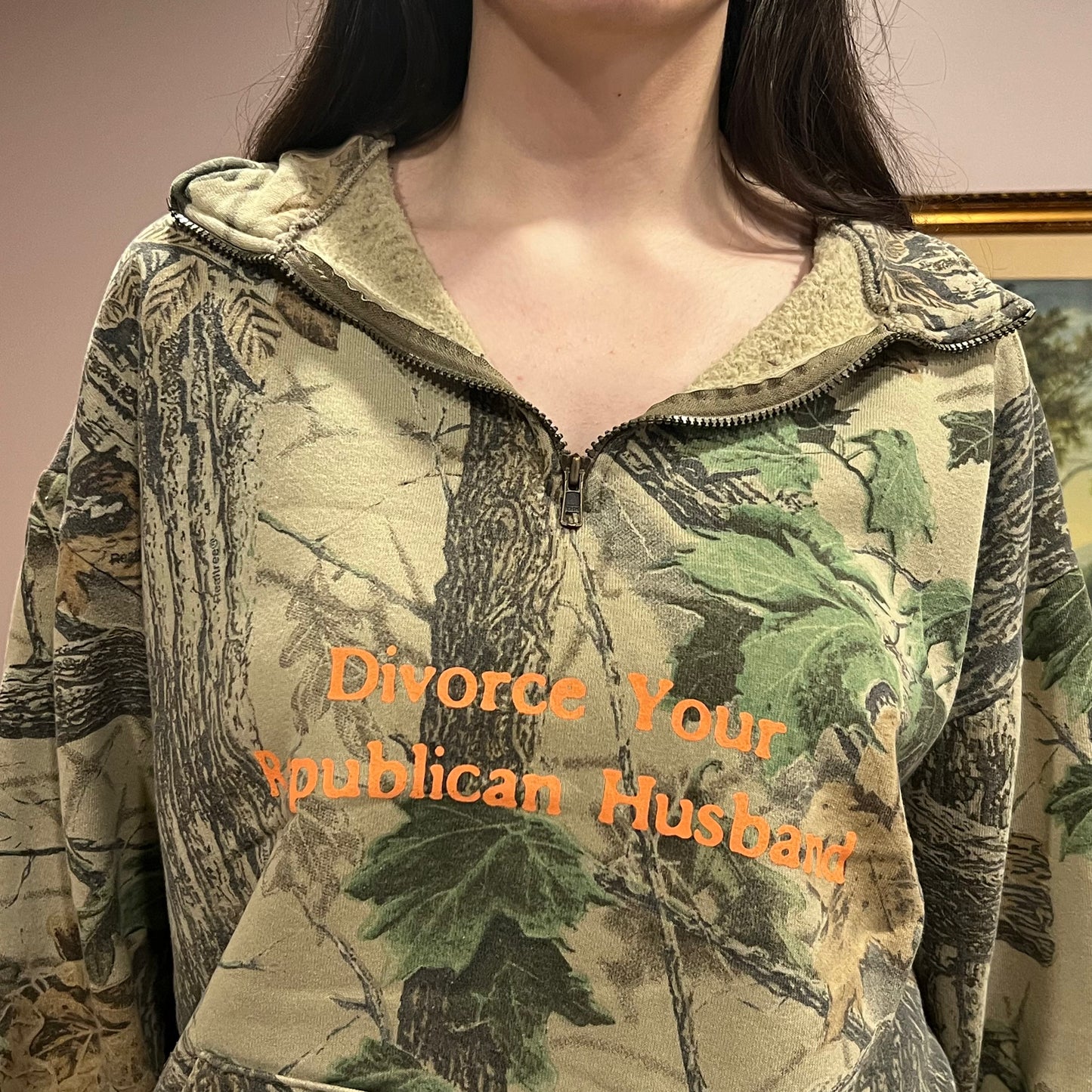 DIVORCE YOUR REPUBLICAN HUSBAND camo zip-up with orange text (L)