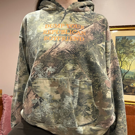 DUMP YOUR REPUBLICAN BOYFRIEND camo hoodie with orange text (XL)