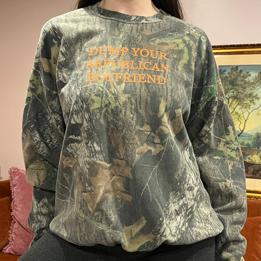 DUMP YOUR REPUBLICAN BOYFRIEND camo crewneck with orange text (XL)