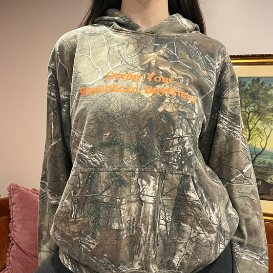 DUMP YOUR REPUBLICAN BOYFRIEND camo hoodie with orange text (XL)