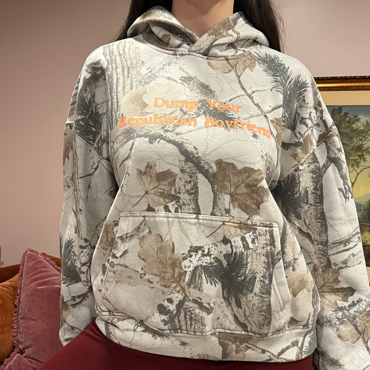 DUMP YOUR REPUBLICAN BOYFRIEND white camo hoodie with orange text (S)