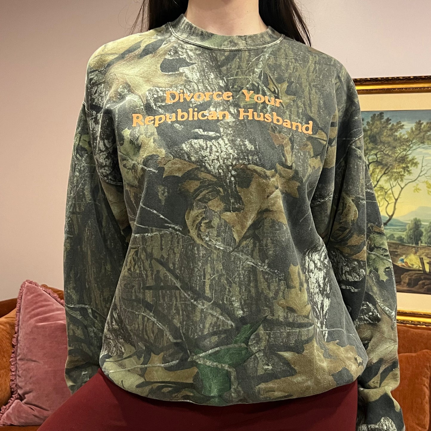 DIVORCE YOUR REPUBLICAN HUSBAND camo crewneck with orange text (L)