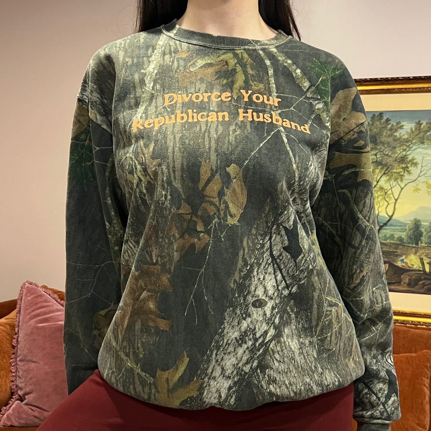 DIVORCE YOUR REPUBLICAN HUSBAND camo crewneck with orange text (L)