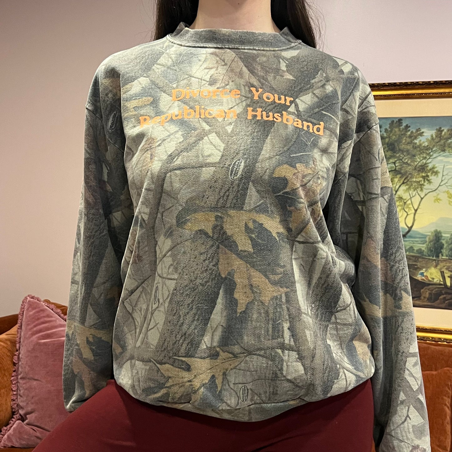 DIVORCE YOUR REPUBLICAN HUSBAND camo crewneck with orange text (M)
