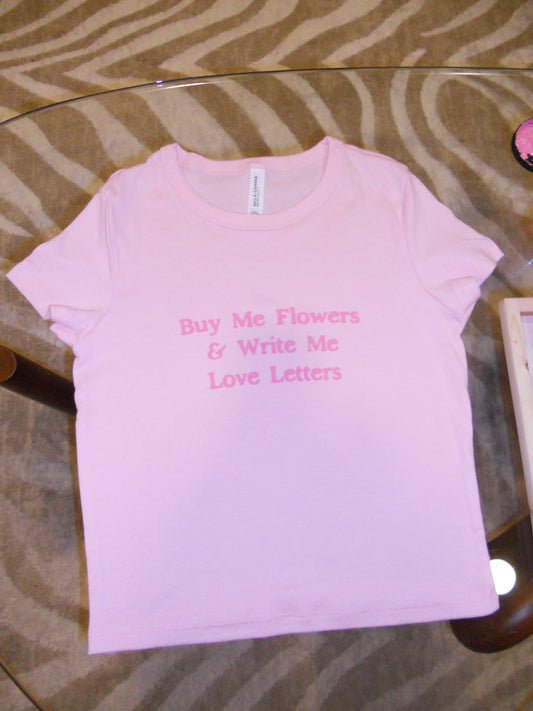 BUY ME FLOWERS & WRITE ME LOVE LETTERS pink baby tee