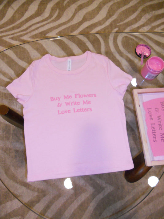 BUY ME FLOWERS & WRITE ME LOVE LETTERS pink baby tee