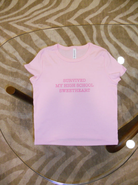 SURVIVED MY HIGH SCHOOL SWEETHEART pink baby tee