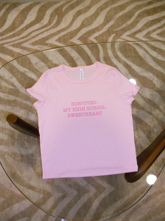 SURVIVED MY HIGH SCHOOL SWEETHEART pink baby tee