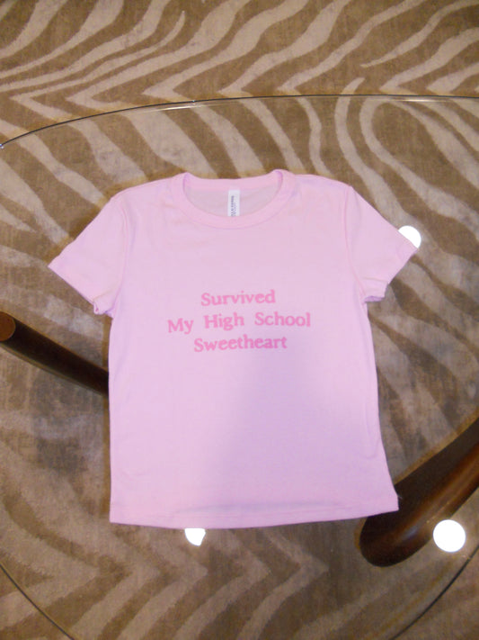 SURVIVED MY HIGH SCHOOL SWEETHEART pink baby tee