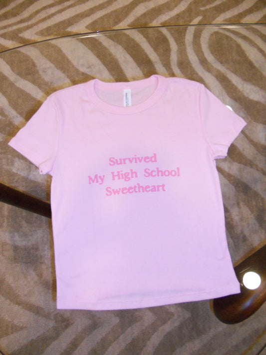SURVIVED MY HIGH SCHOOL SWEETHEART pink baby tee