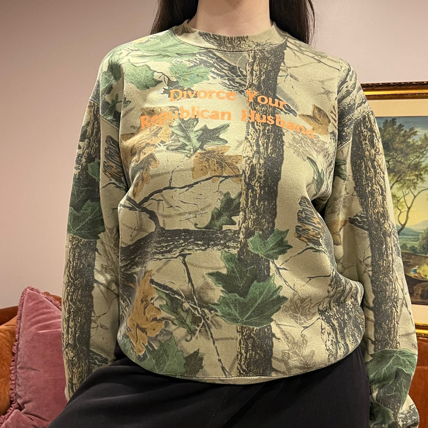 DIVORCE YOUR REPUBLICAN HUSBAND camo crewneck with orange text (M)