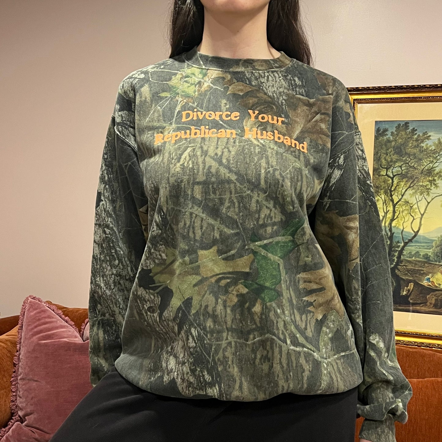 DIVORCE YOUR REPUBLICAN HUSBAND camo crewneck with orange text (L)