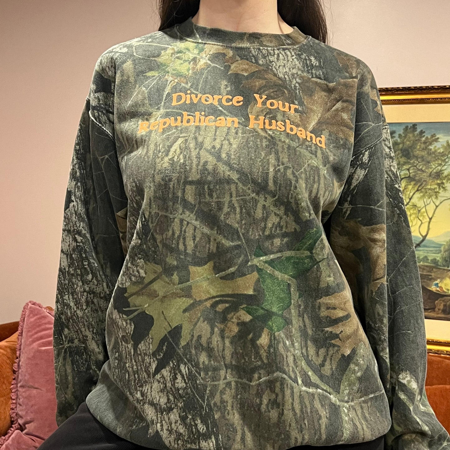 DIVORCE YOUR REPUBLICAN HUSBAND camo crewneck with orange text (L)