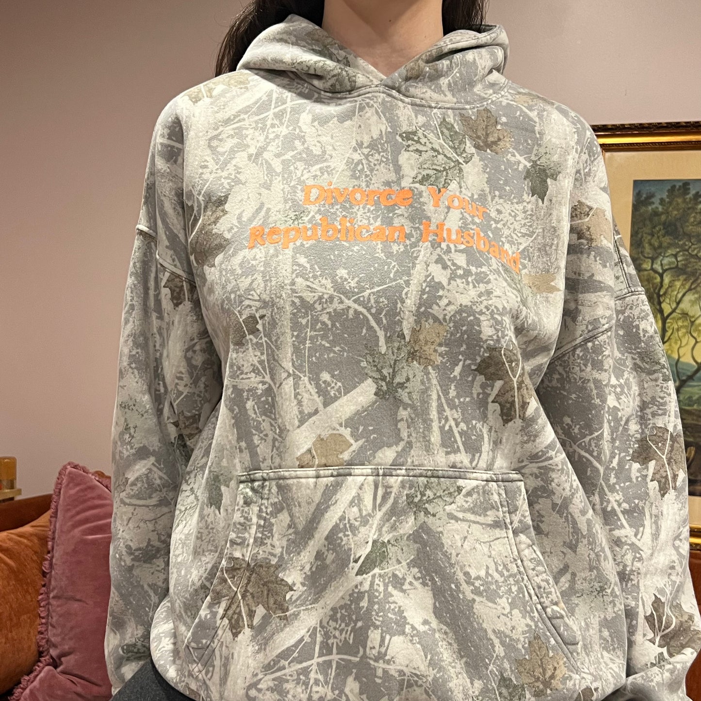 DIVORCE YOUR REPUBLICAN HUSBAND white camo hoodie with orange text (L)