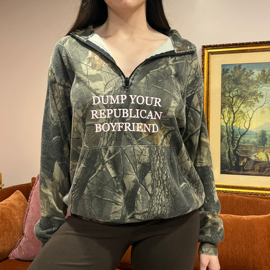 DUMP YOUR REPUBLICAN BOYFRIEND camo zip-up with pink text (M)