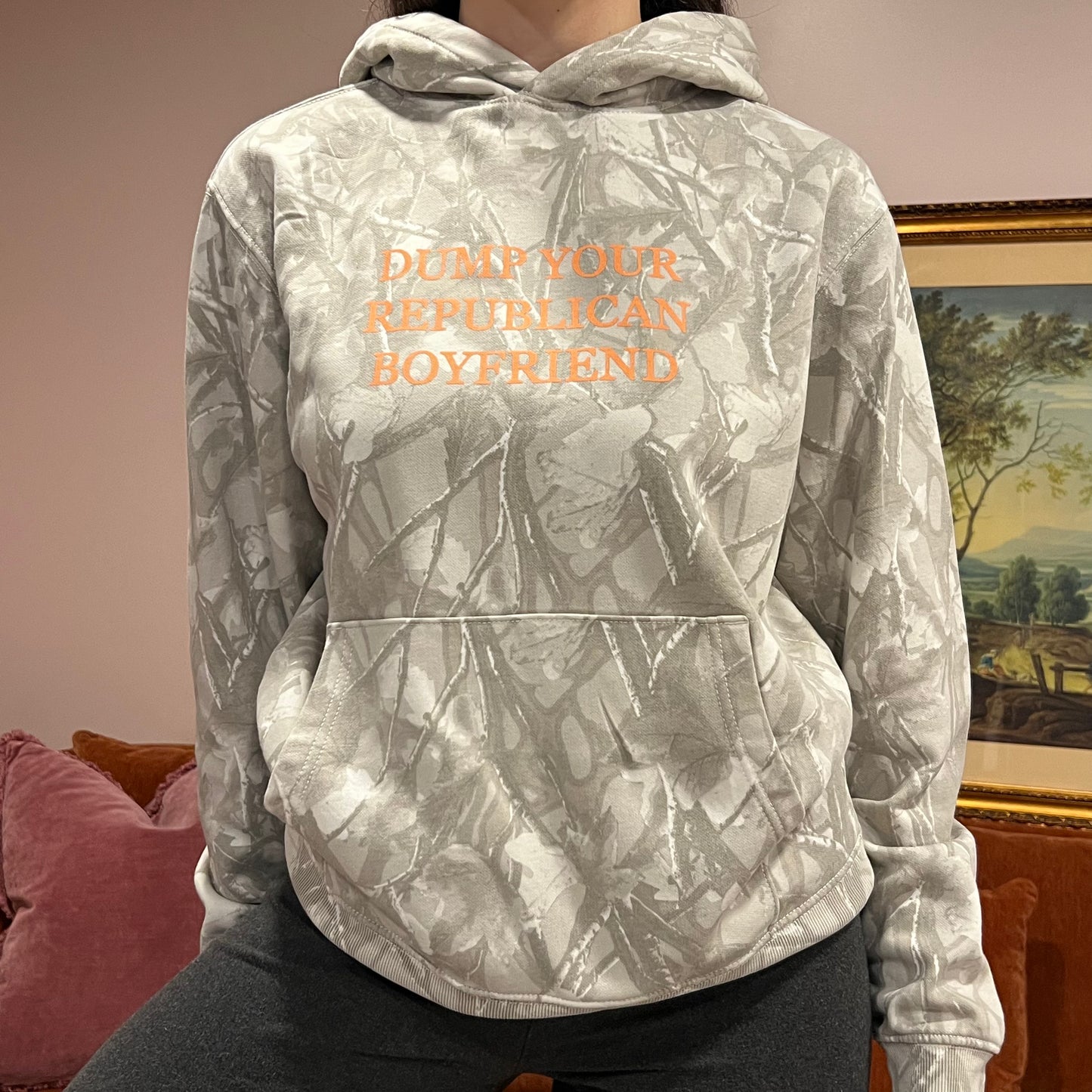 DUMP YOUR REPUBLICAN BOYFRIEND white camo hoodie with orange text (S)