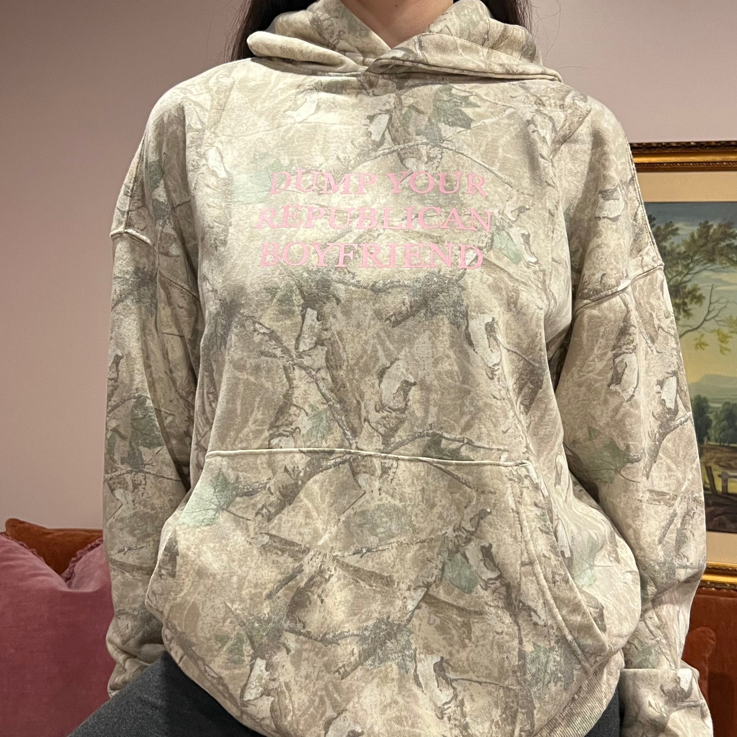 DUMP YOUR REPUBLICAN BOYFRIEND camo hoodie with pink text (M)
