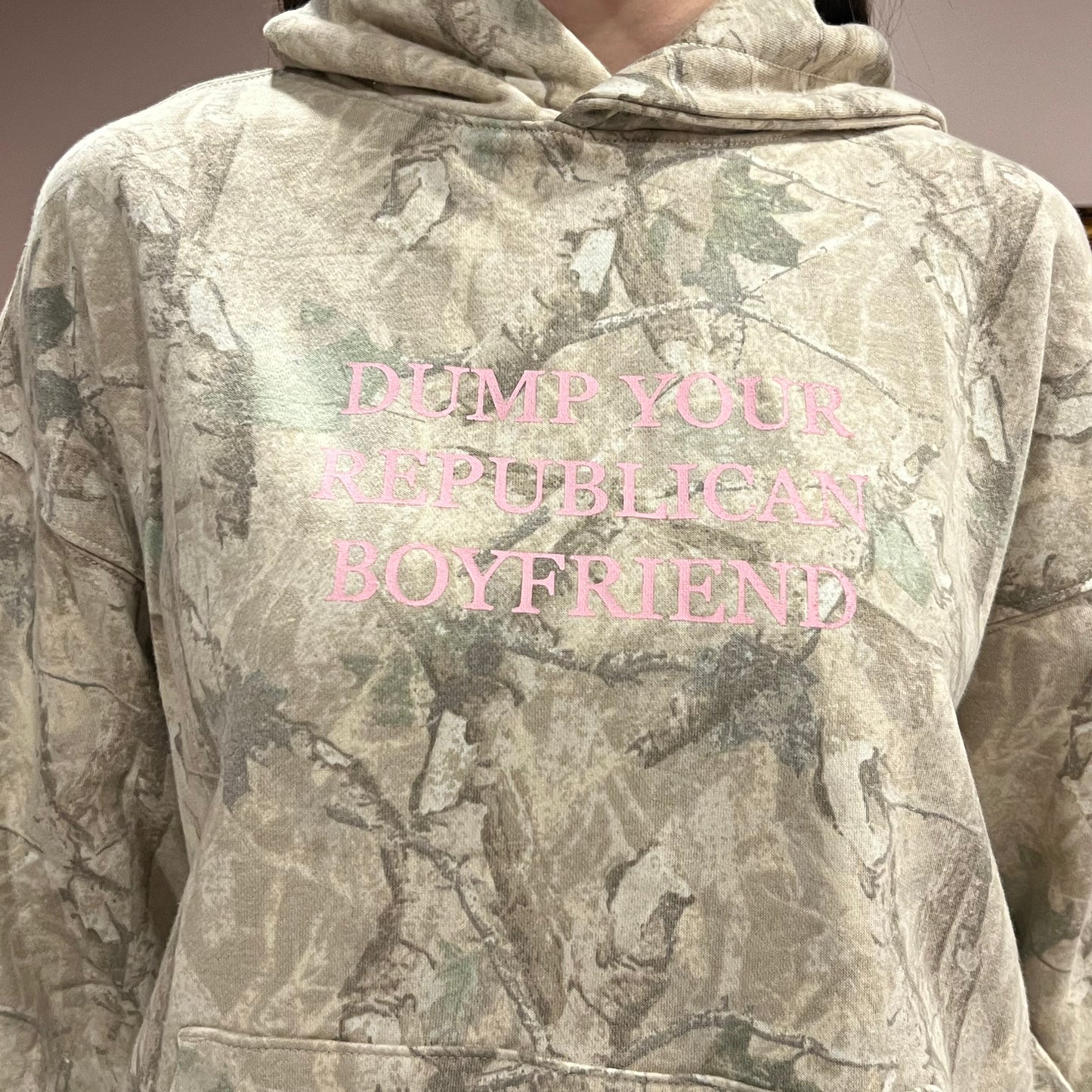DUMP YOUR REPUBLICAN BOYFRIEND camo hoodie with pink text (M)