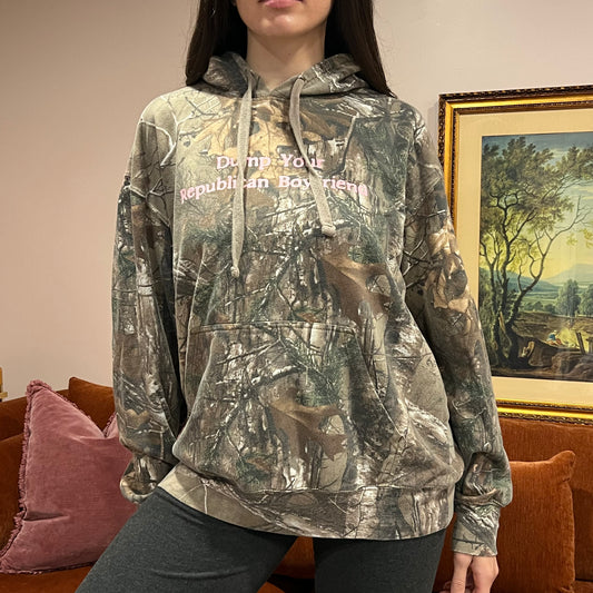 DUMP YOUR REPUBLICAN BOYFRIEND camo hoodie with pink text (XL)
