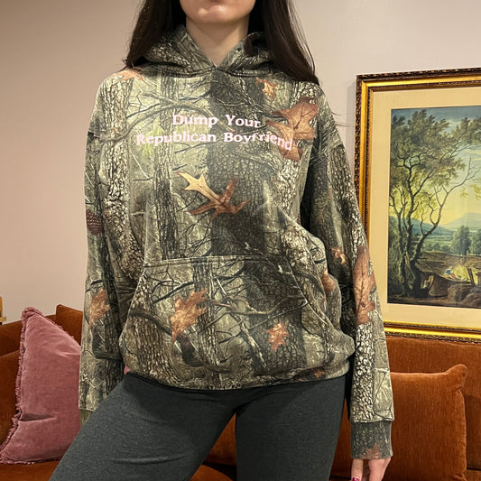 DUMP YOUR REPUBLICAN BOYFRIEND camo hoodie with pink text (L)