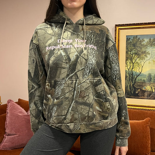 DUMP YOUR REPUBLICAN BOYFRIEND camo hoodie with pink text (L)