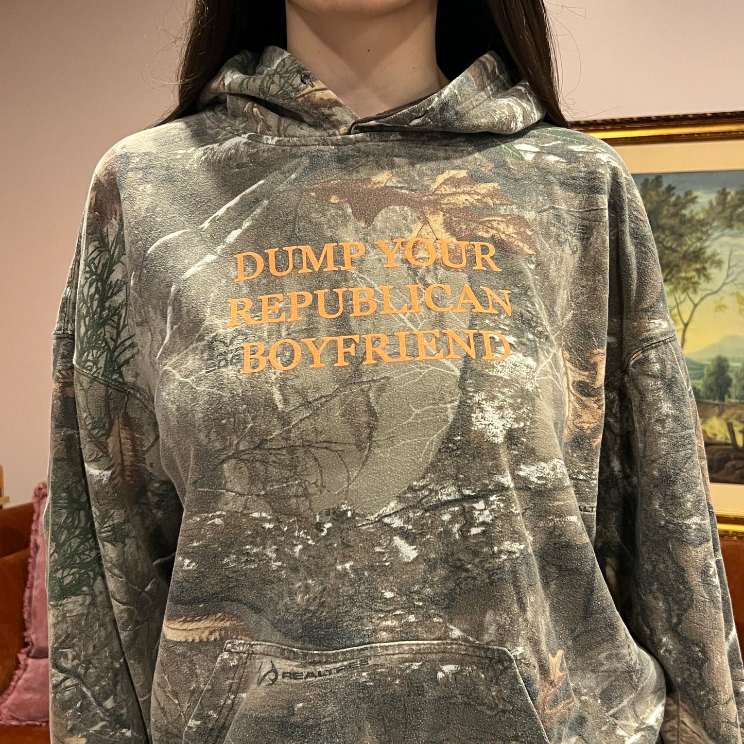 DUMP YOUR REPUBLICAN BOYFRIEND camo hoodie with orange text (L)