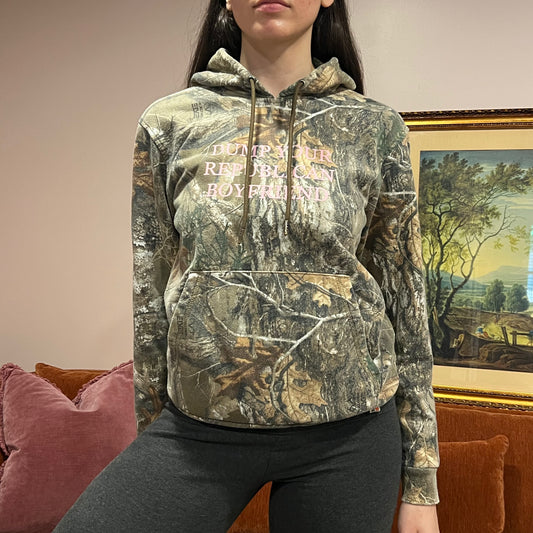 DUMP YOUR REPUBLICAN BOYFRIEND camo hoodie with pink text (S)