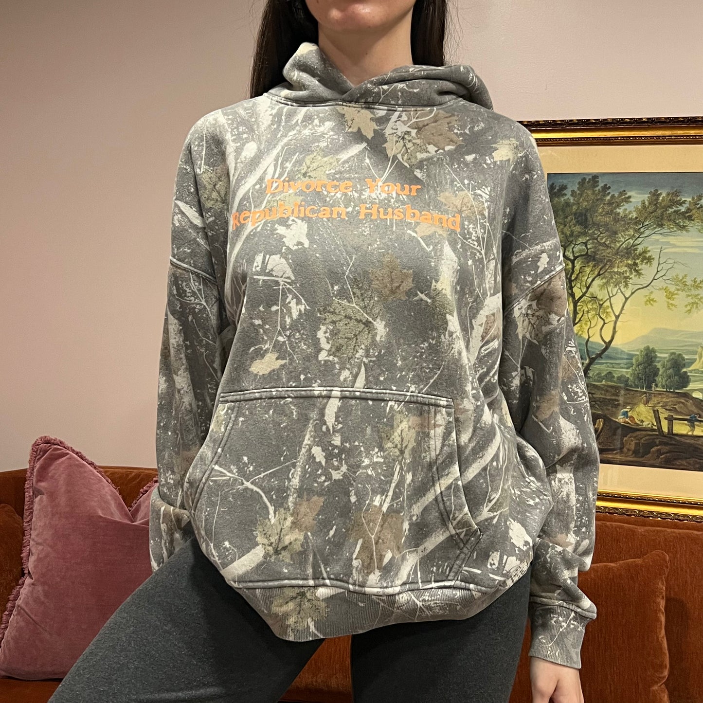 DIVORCE YOUR REPUBLICAN HUSBAND camo hoodie with orange text (L)