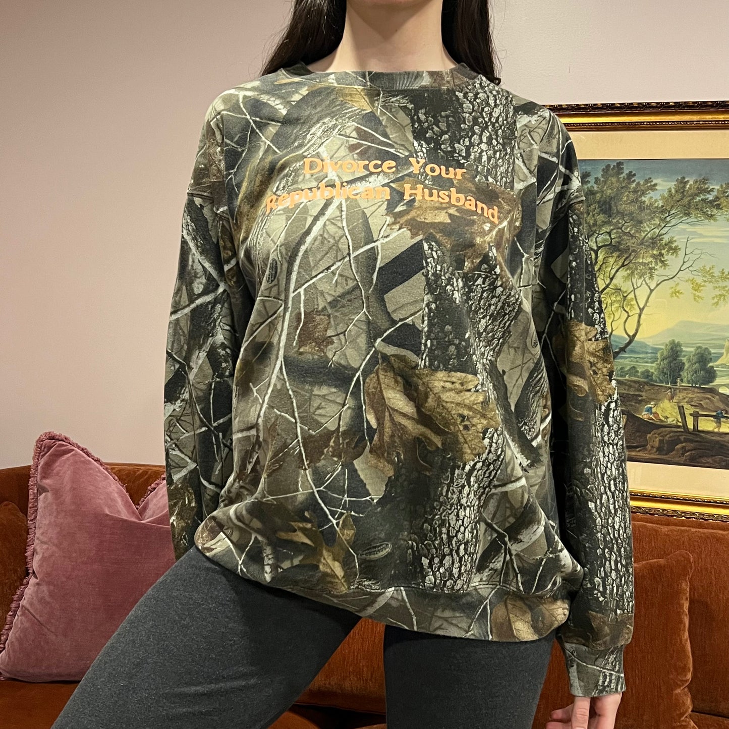 DIVORCE YOUR REPUBLICAN HUSBAND camo crewneck with orange text (XL)