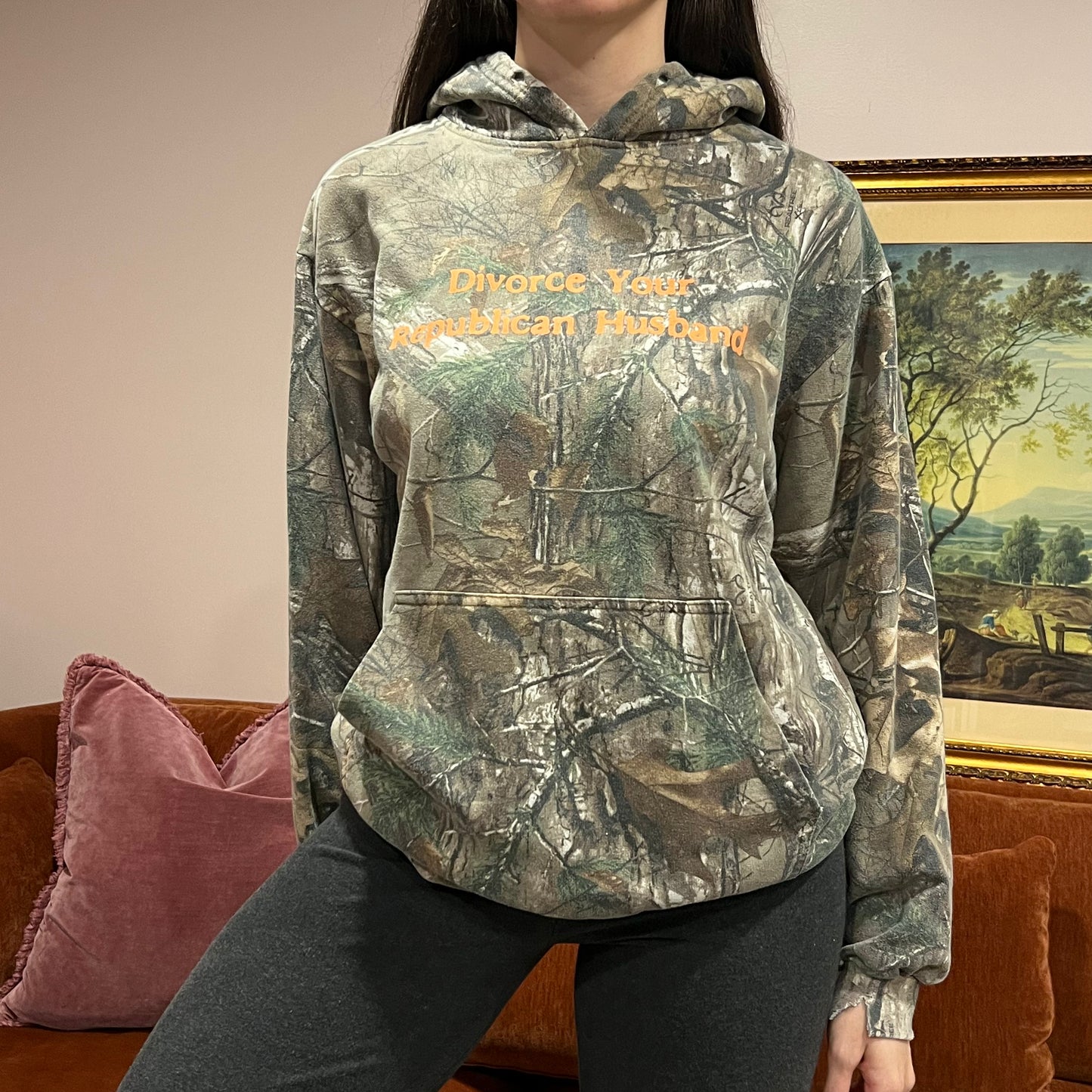 DIVORCE YOUR REPUBLICAN HUSBAND camo hoodie with orange text (L)