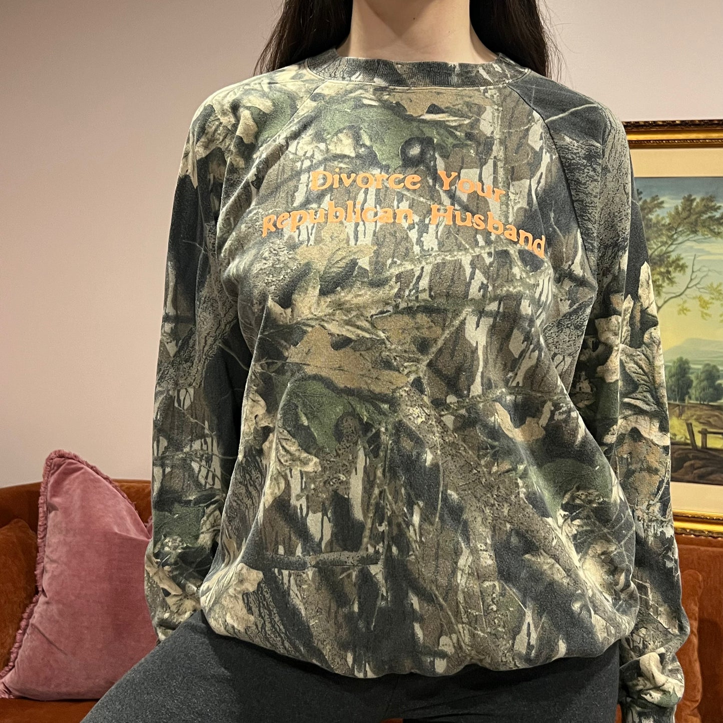DIVORCE YOUR REPUBLICAN HUSBAND camo crewneck with orange text (L)