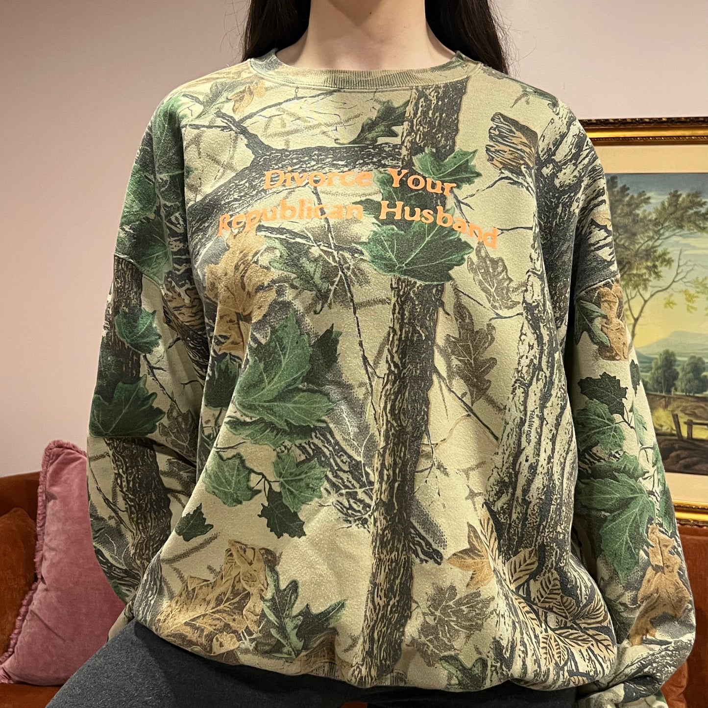 DIVORCE YOUR REPUBLICAN HUSBAND camo crewneck with orange text (2XL)
