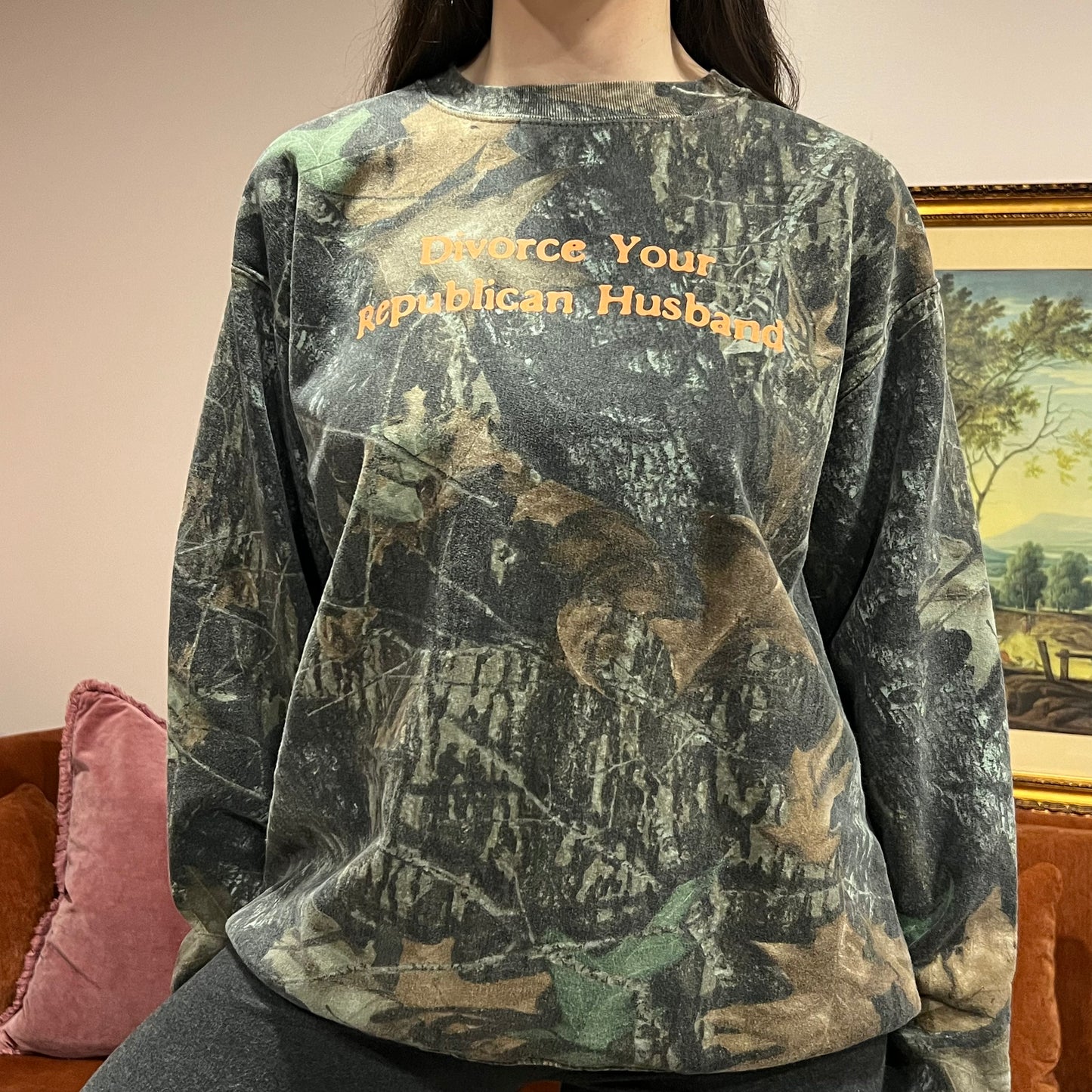 DIVORCE YOUR REPUBLICAN HUSBAND camo crewneck with orange text (L)