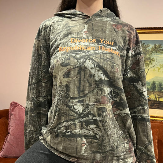 DIVORCE YOUR REPUBLICAN HUSBAND camo hoodie with orange text (XL)