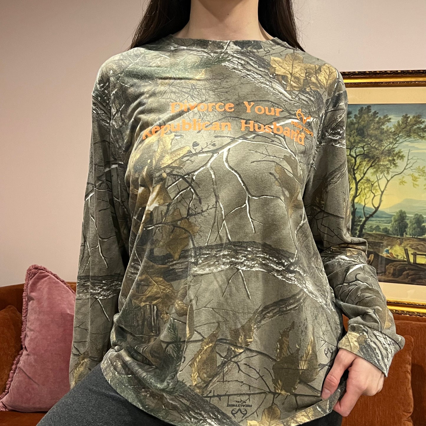 DIVORCE YOUR REPUBLICAN HUSBAND camo long sleeve t-shirt with orange text (L)