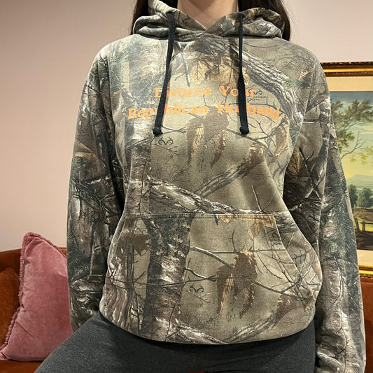 DIVORCE YOUR REPUBLICAN HUSBAND camo hoodie with orange text (M)
