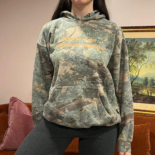 DIVORCE YOUR REPUBLICAN HUSBAND camo hoodie with orange text (M)