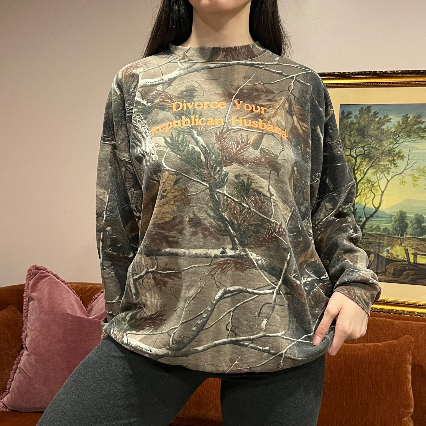DIVORCE YOUR REPUBLICAN HUSBAND camo crewneck with orange text (2XL)