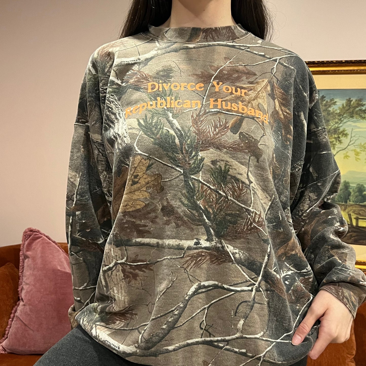 DIVORCE YOUR REPUBLICAN HUSBAND camo crewneck with orange text (2XL)
