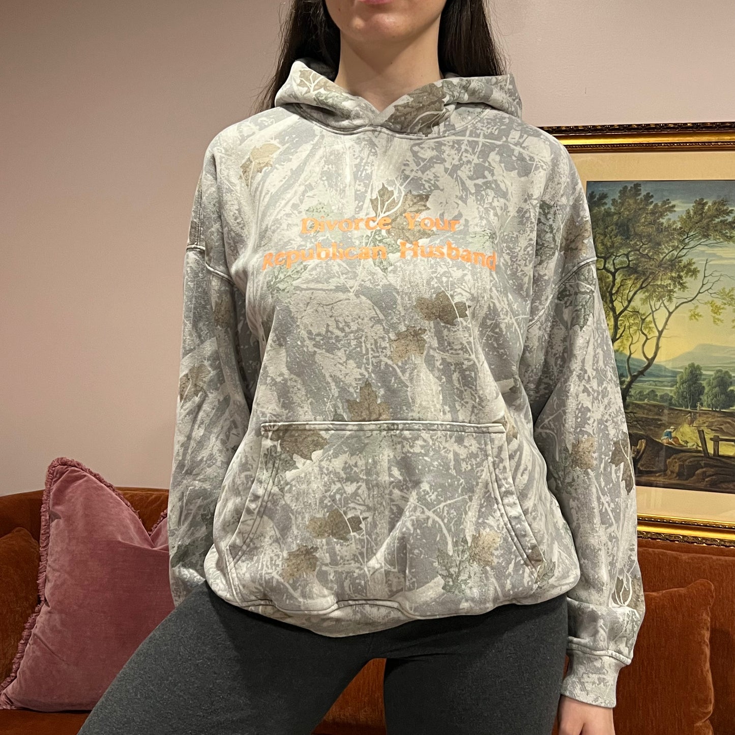 DIVORCE YOUR REPUBLICAN HUSBAND white camo hoodie with orange text (M)