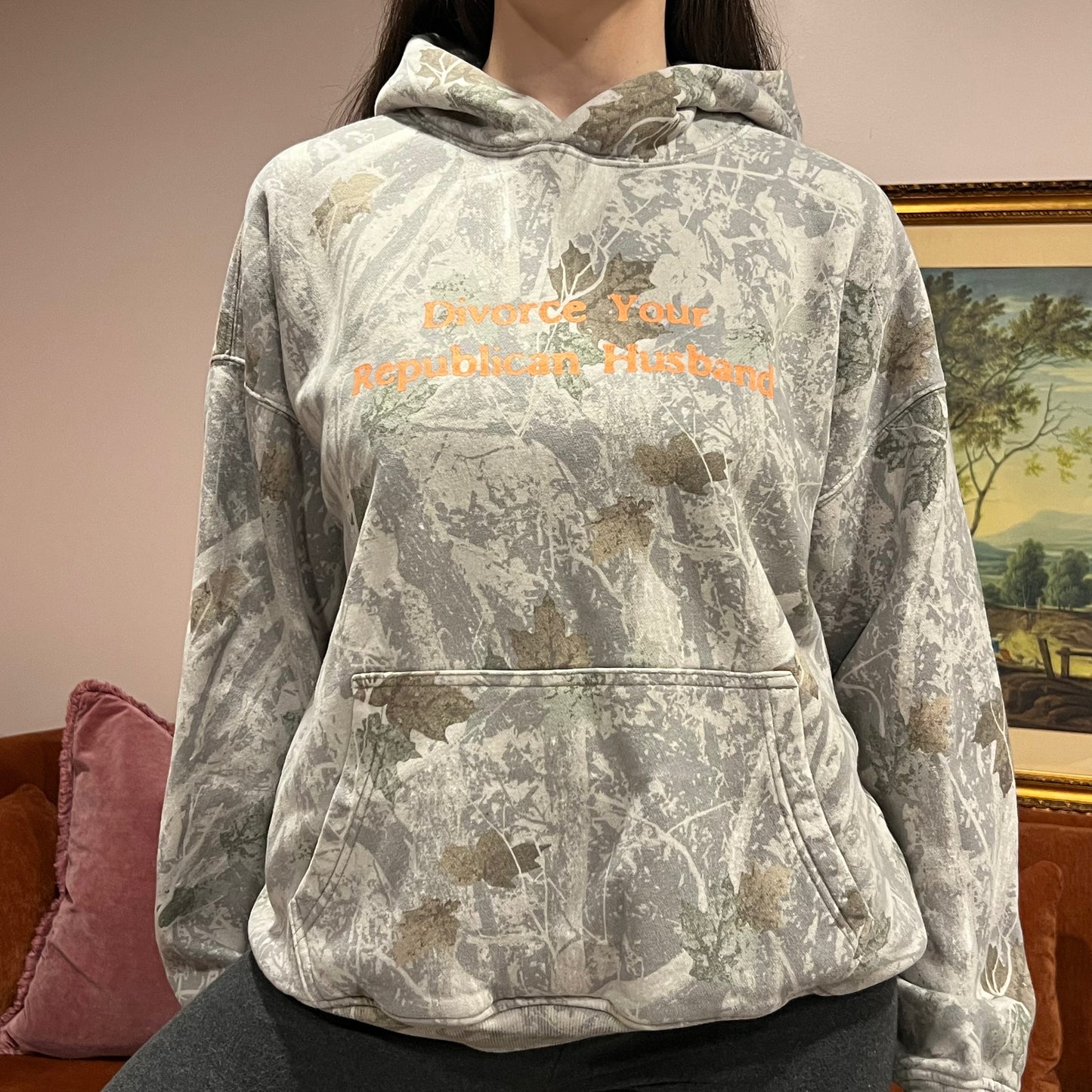 DIVORCE YOUR REPUBLICAN HUSBAND white camo hoodie with orange text (M)