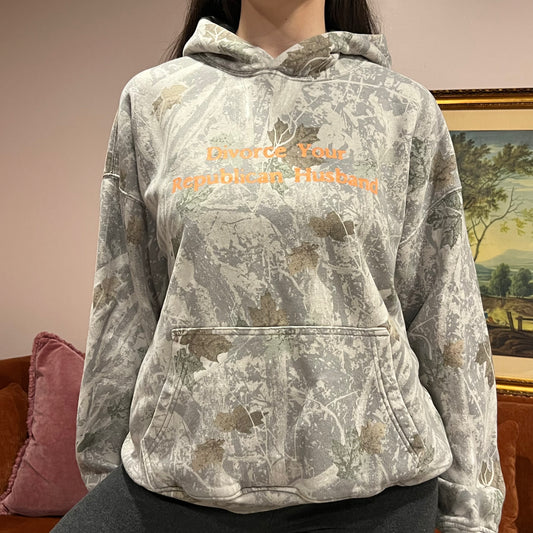 DIVORCE YOUR REPUBLICAN HUSBAND white camo hoodie with orange text (M)