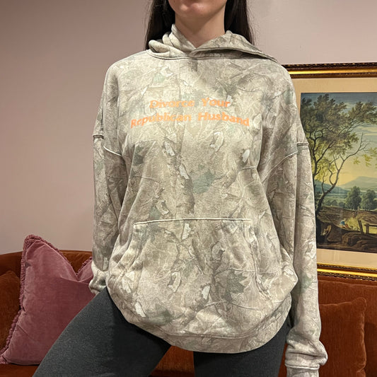 DIVORCE YOUR REPUBLICAN HUSBAND white camo hoodie with orange text (L)