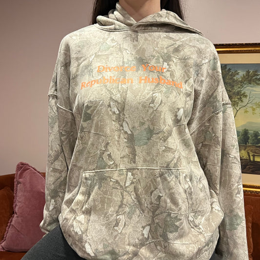 DIVORCE YOUR REPUBLICAN HUSBAND white camo hoodie with orange text (L)