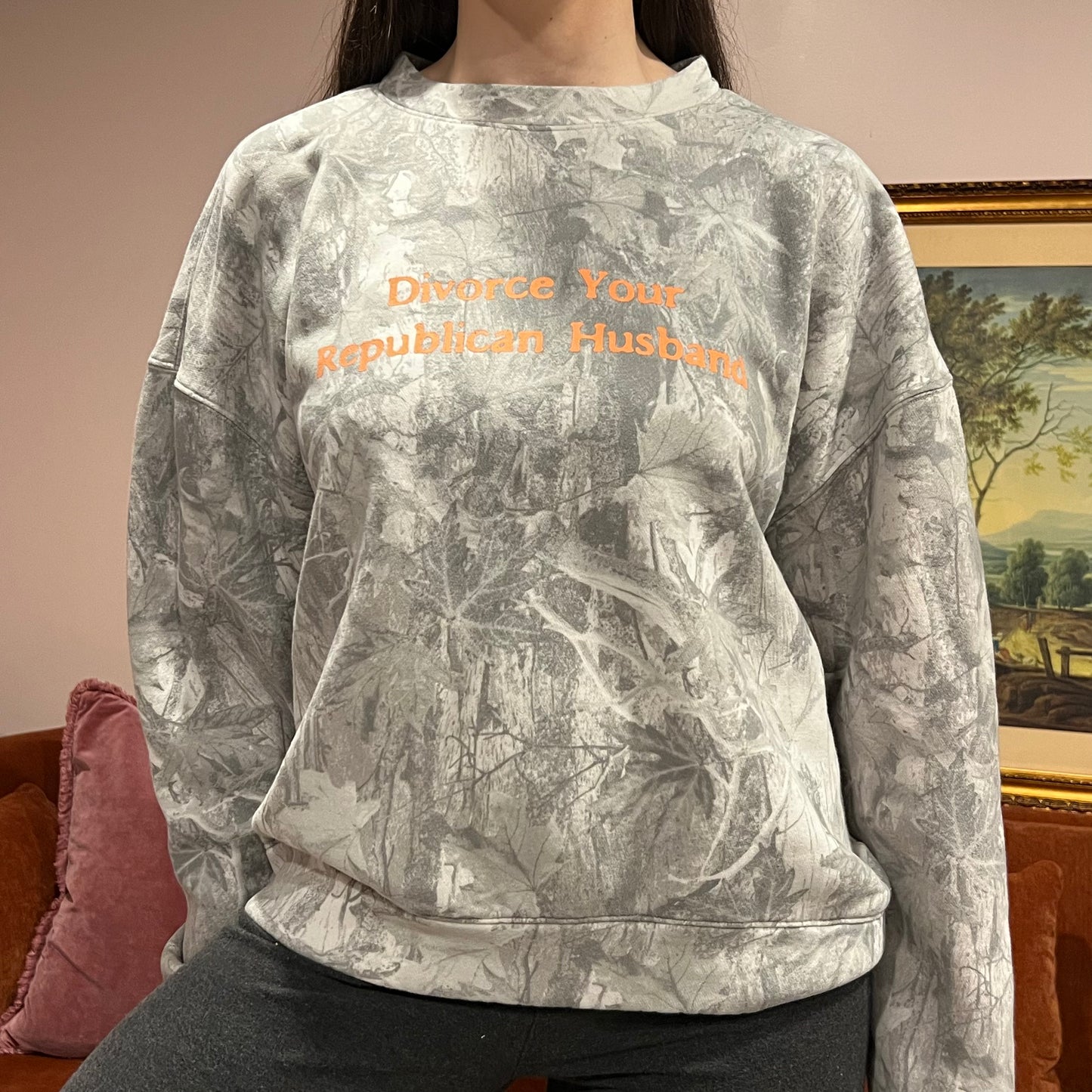 DIVORCE YOUR REPUBLICAN HUSBAND white camo crewneck with orange text (M)